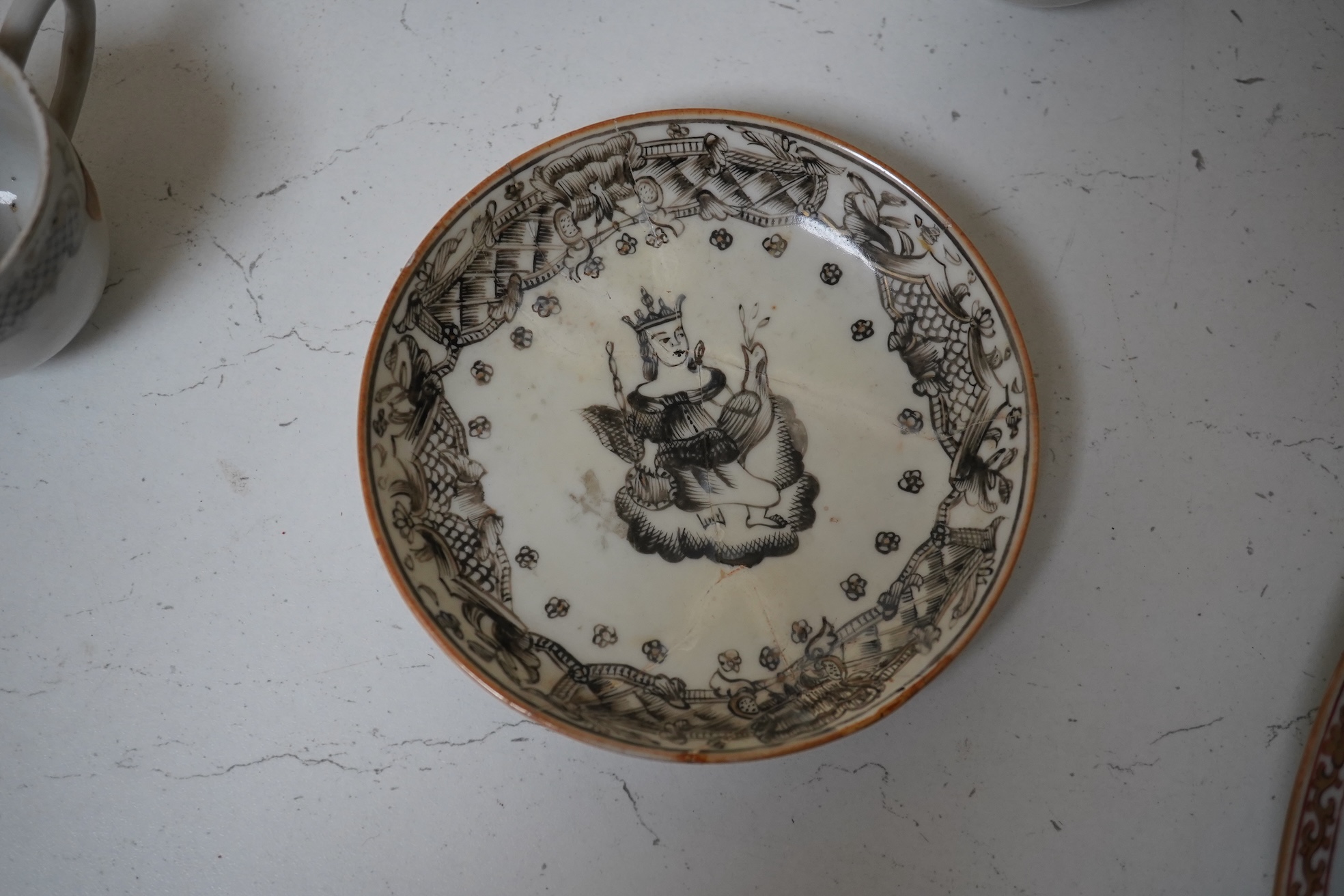 Six assorted 18th century Chinese export coffee cups with armorial decoration, and a similar European subject cup and saucer. Condition - damaged/restored